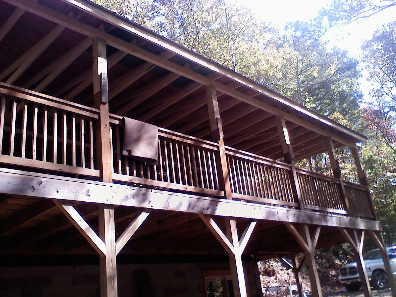 Timber framing under a new elevated porch and deck — Roof Leak Repair in Rantoul by Roofing Brothers